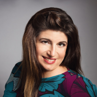 Coreyne_Woodman-Holoubek seen posing for a photo in a loose hair, hair style